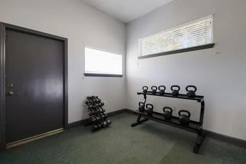 a view of a room with gym equipment