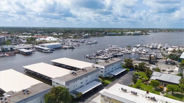 an aerial view of a balcony with chairs