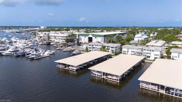 a view of a ocean with boats and lake view