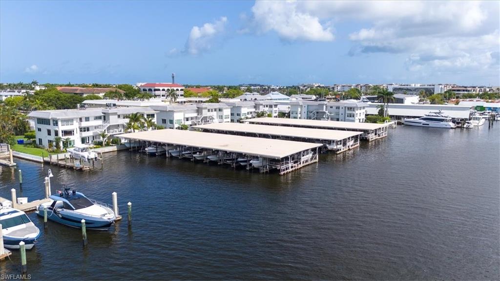 1100 8th Avenue South, Unit 123F Naples, FL 34102 - Photo 27 of 30 a view of a ocean with boats and lake view
