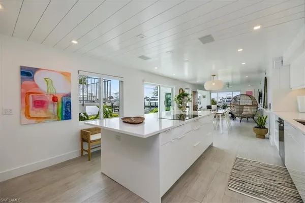 a kitchen with stainless steel appliances lots of counter top space