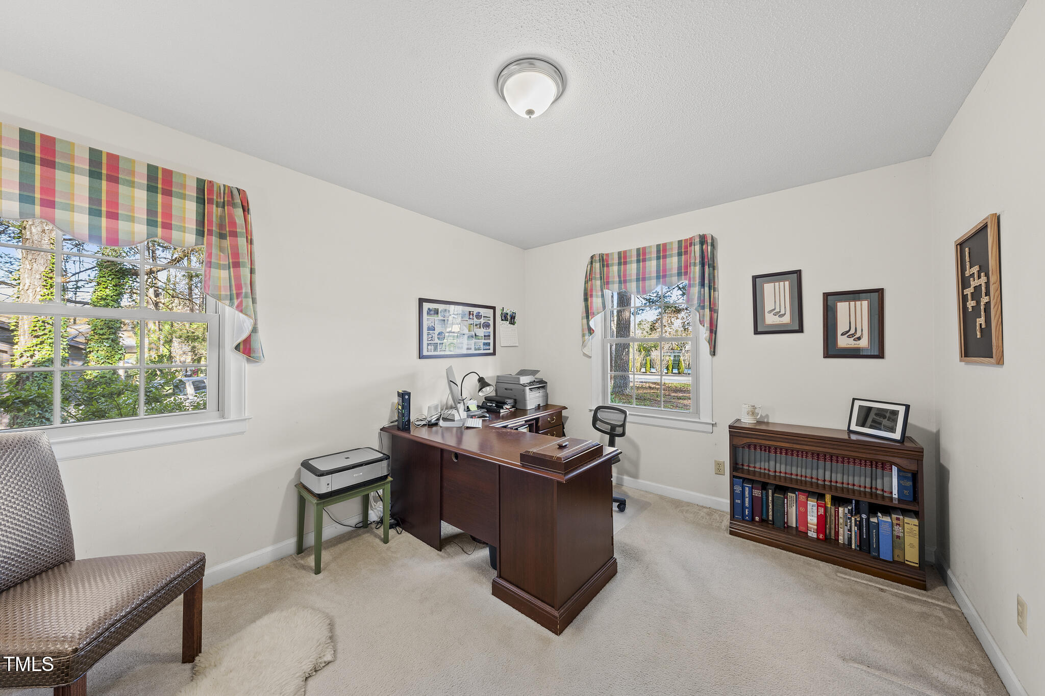 11801 Strickland Road Raleigh, NC 27613 - Photo 20 of 38 a living room with furniture and a window