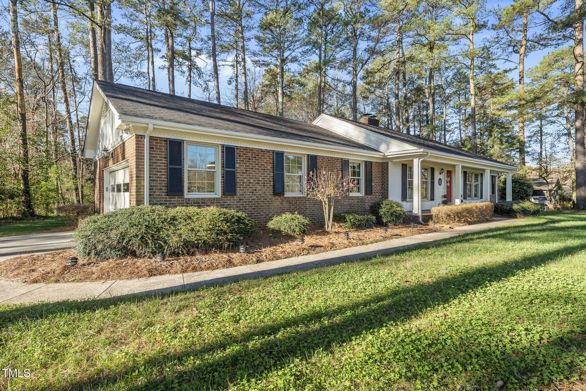 11801 Strickland Road Raleigh, NC 27613 - Photo 3 of 38 front view of a house with a yard