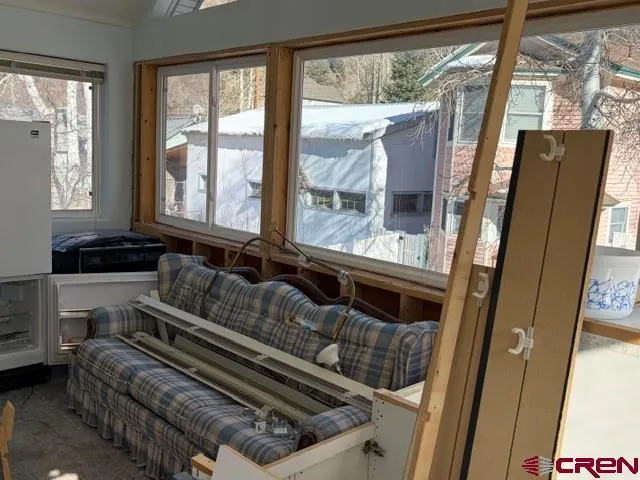 a view of a house with a tree