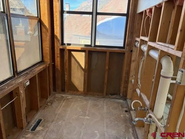 a view of entryway with a front door