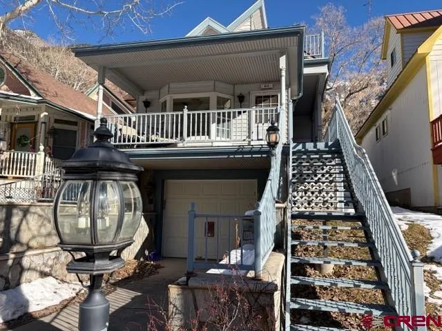 a view of balcony with wooden floor