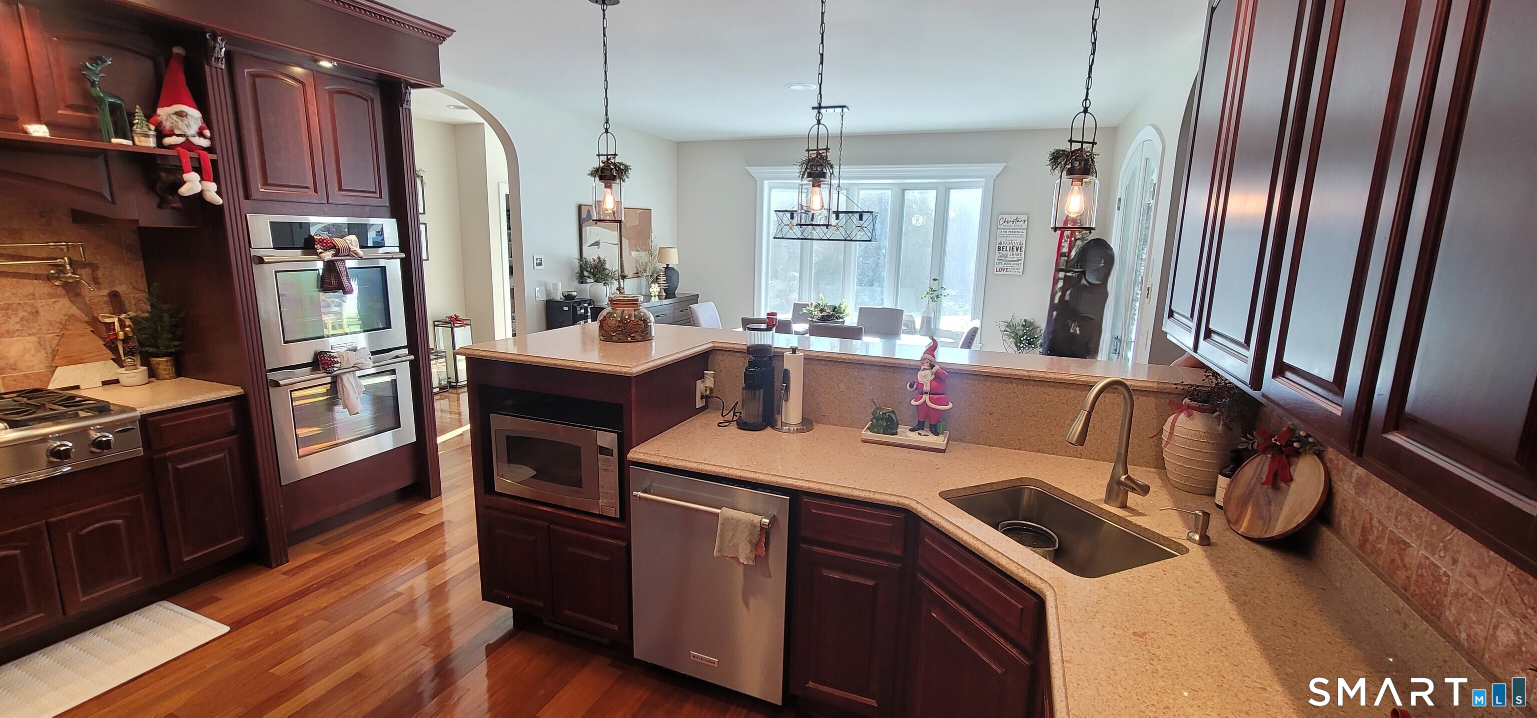 1461 Bunker Hill Road Watertown, CT 06795 - Photo 14 of 22 a open kitchen with stainless steel appliances granite countertop a sink stove and refrigerator