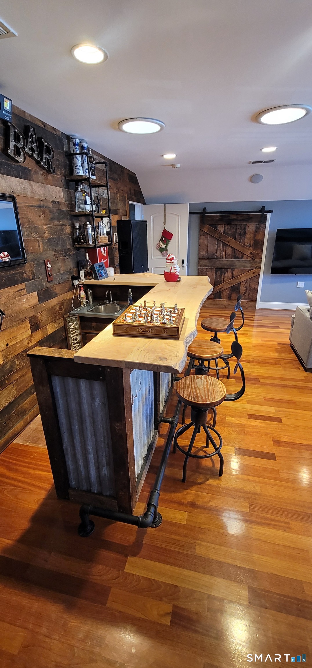 1461 Bunker Hill Road Watertown, CT 06795 - Photo 19 of 22 a room with wooden floor and pool table