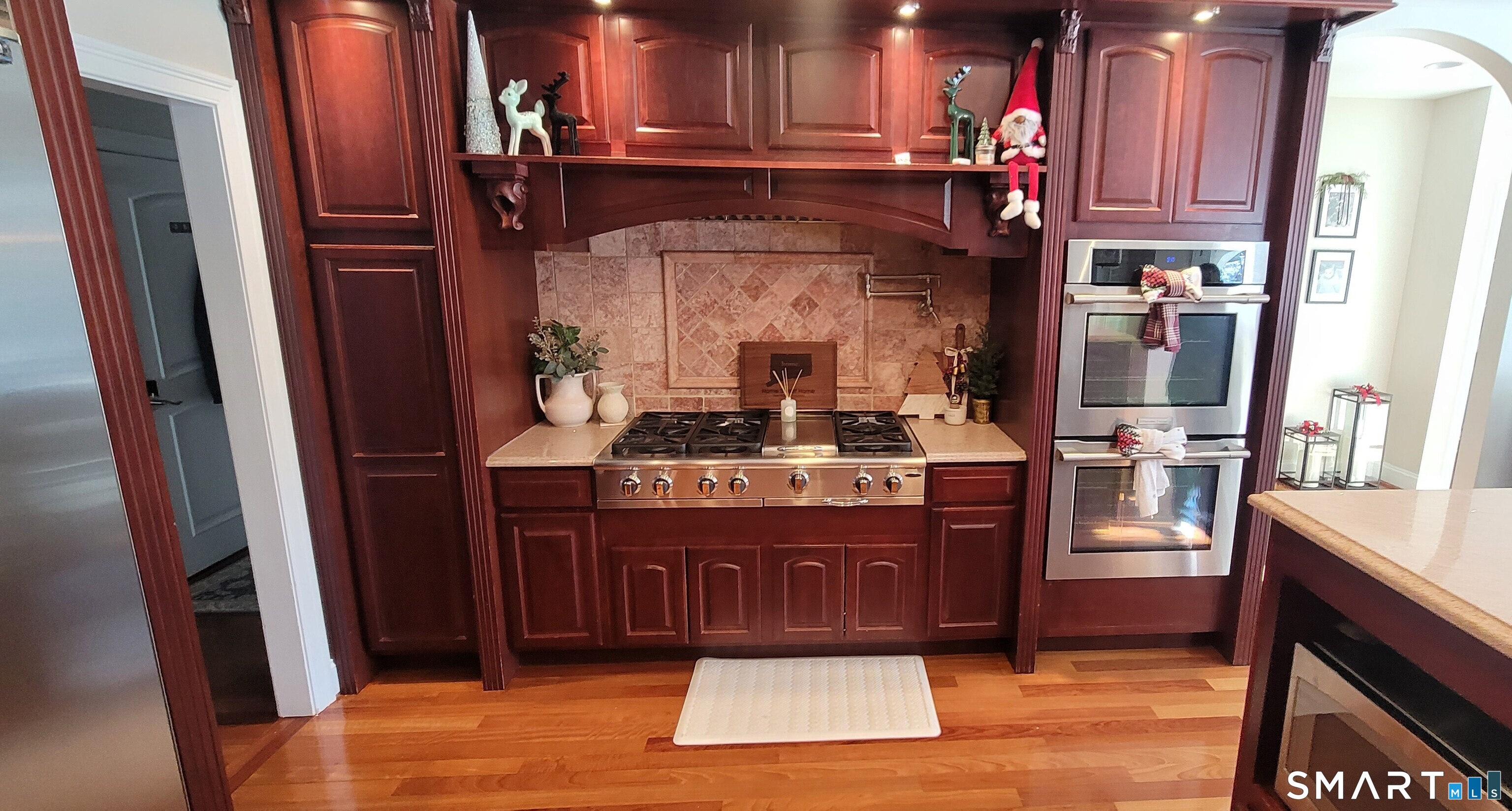 1461 Bunker Hill Road Watertown, CT 06795 - Photo 3 of 22 a view of living room with a sink and wooden floor
