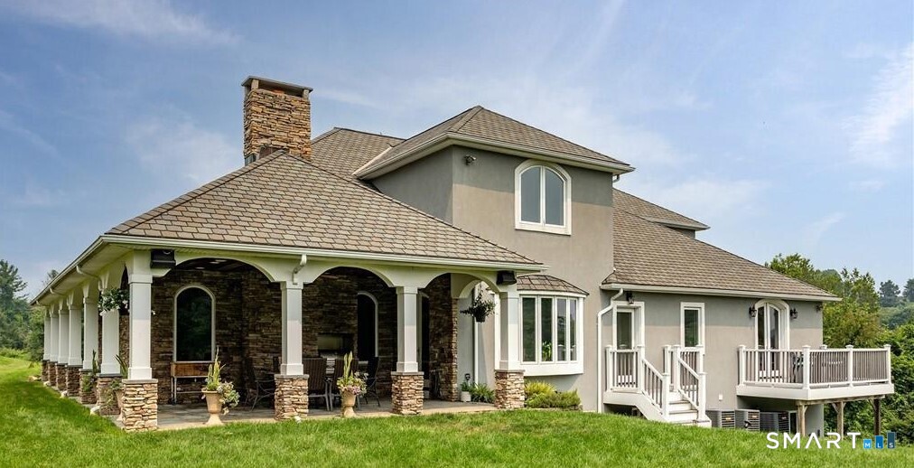 1461 Bunker Hill Road Watertown, CT 06795 - Photo 5 of 22 a view of a house with yard and front view of a house