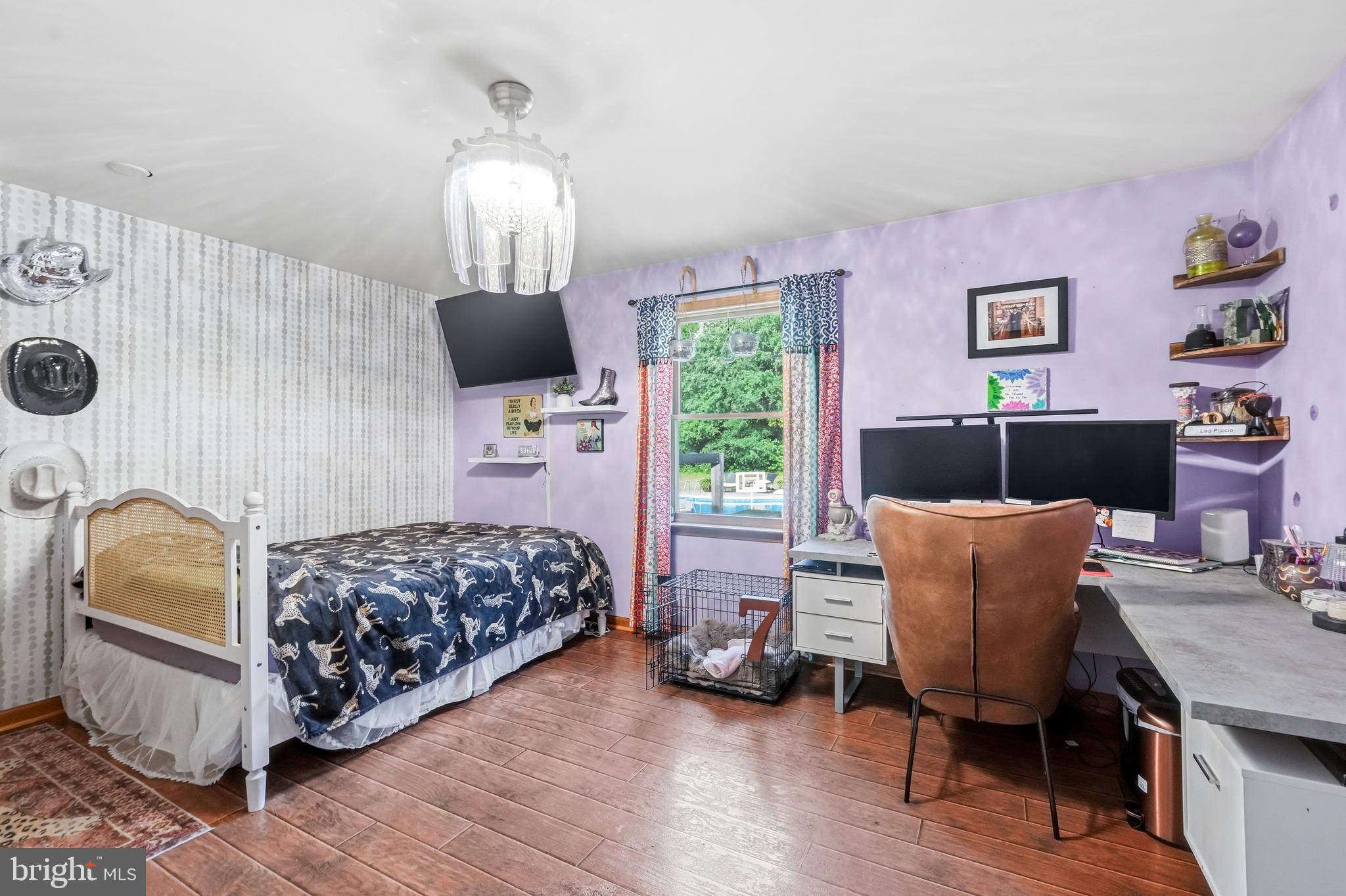 705 Garden Road Pittsgrove, NJ 08318 - Photo 31 of 72 a bed room with a bed and a chair