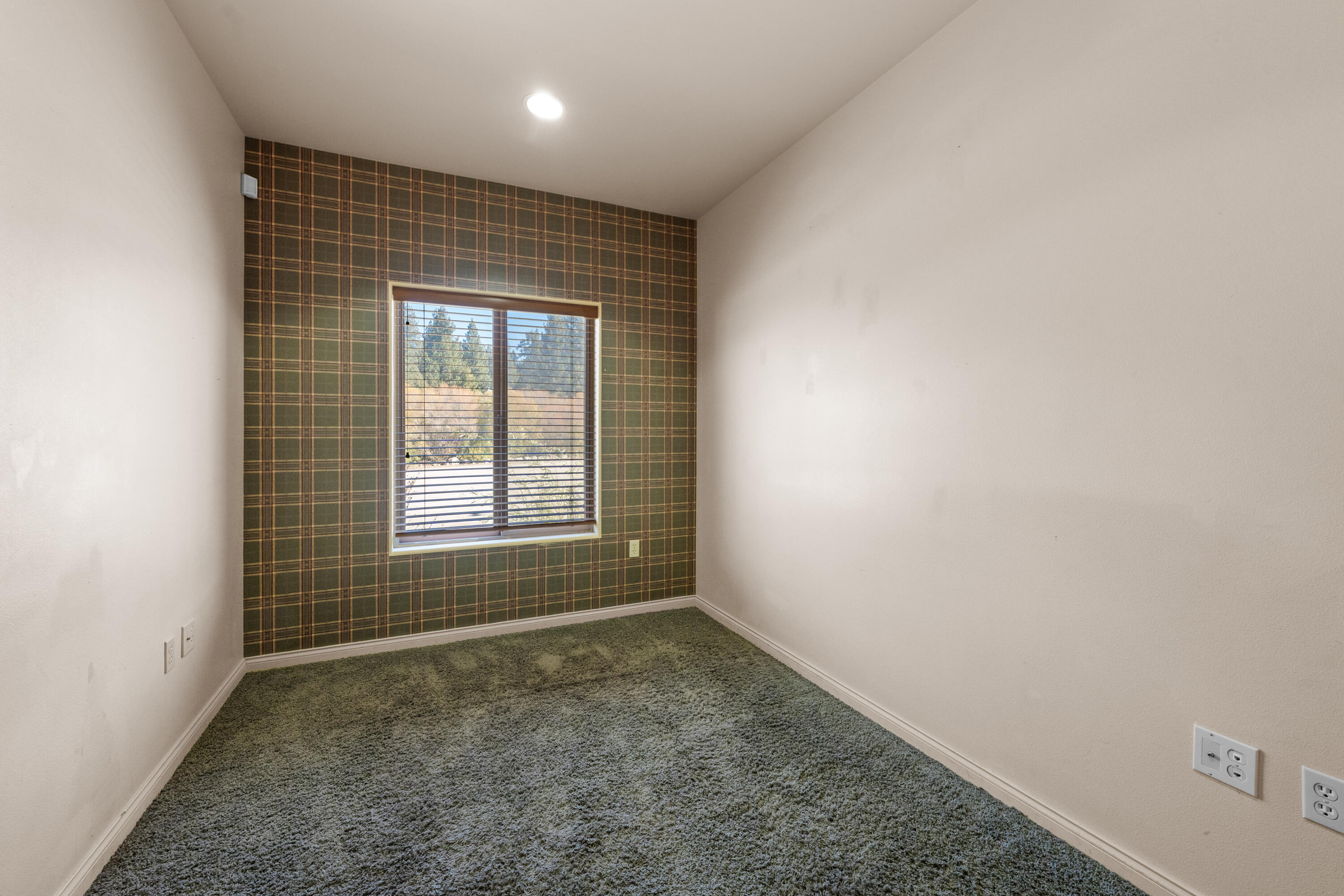 42718 Moonridge Road Big Bear Lake, CA 92315 - Photo 15 of 27 an empty room with a empty space and windows