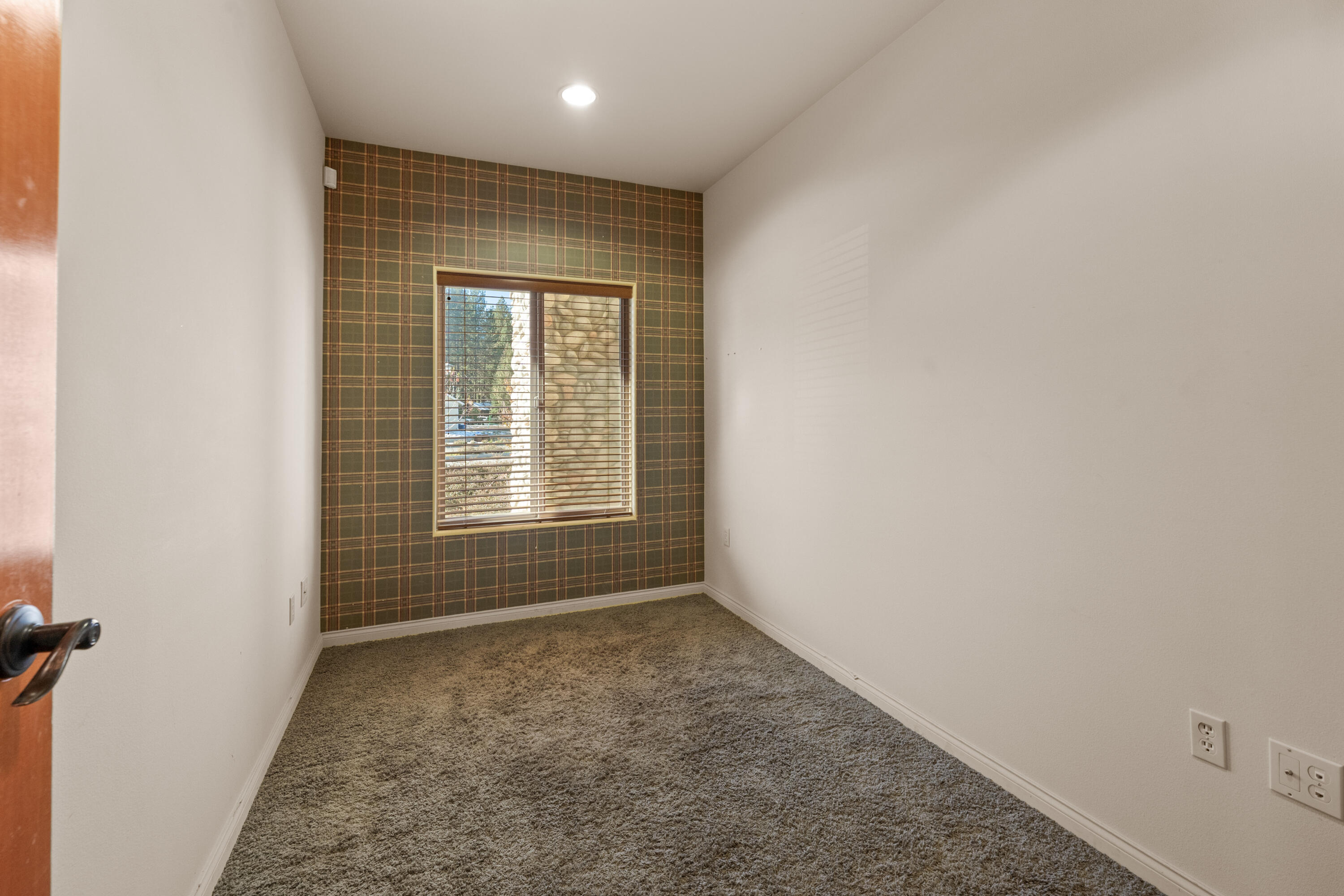 42718 Moonridge Road Big Bear Lake, CA 92315 - Photo 16 of 27 an empty room with a empty space and windows