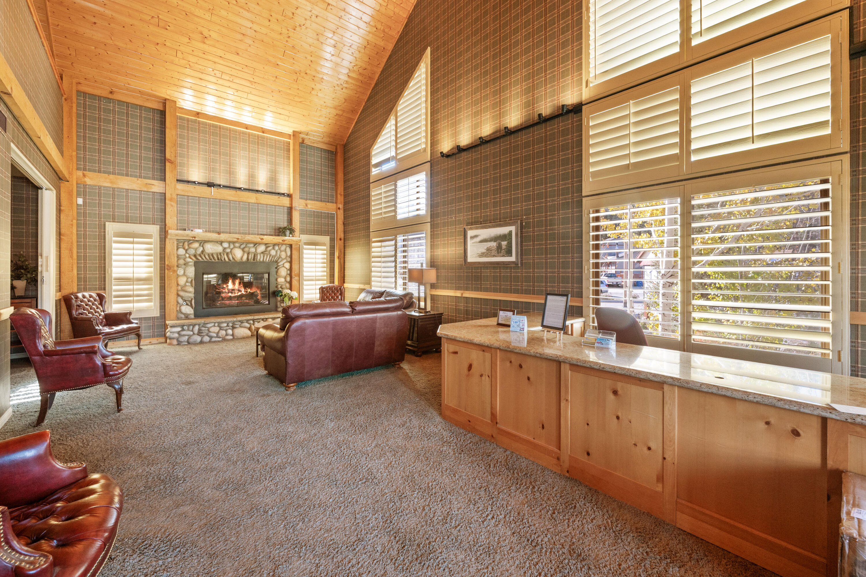 42718 Moonridge Road Big Bear Lake, CA 92315 - Photo 10 of 27 a living room filled with furniture and a large window