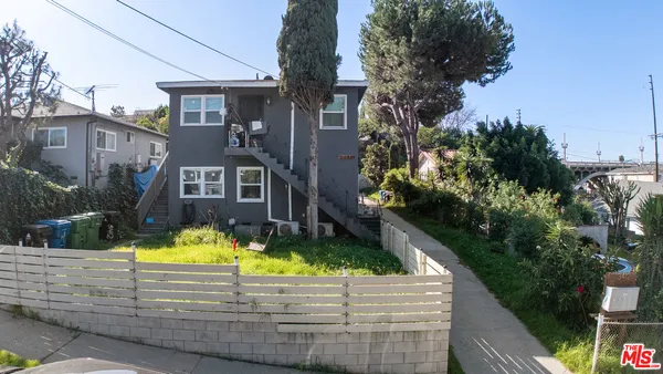 a view of a house with swimming pool