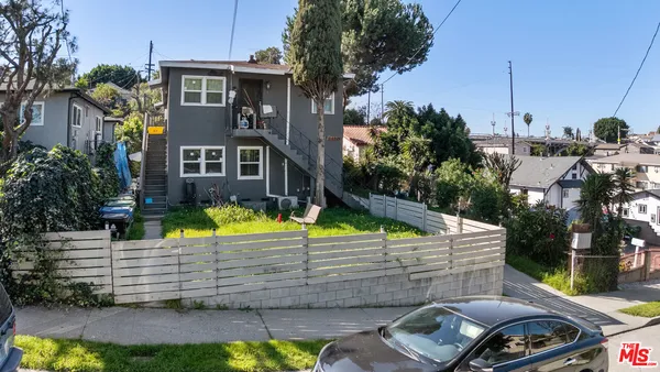 a view of a house with a swimming pool