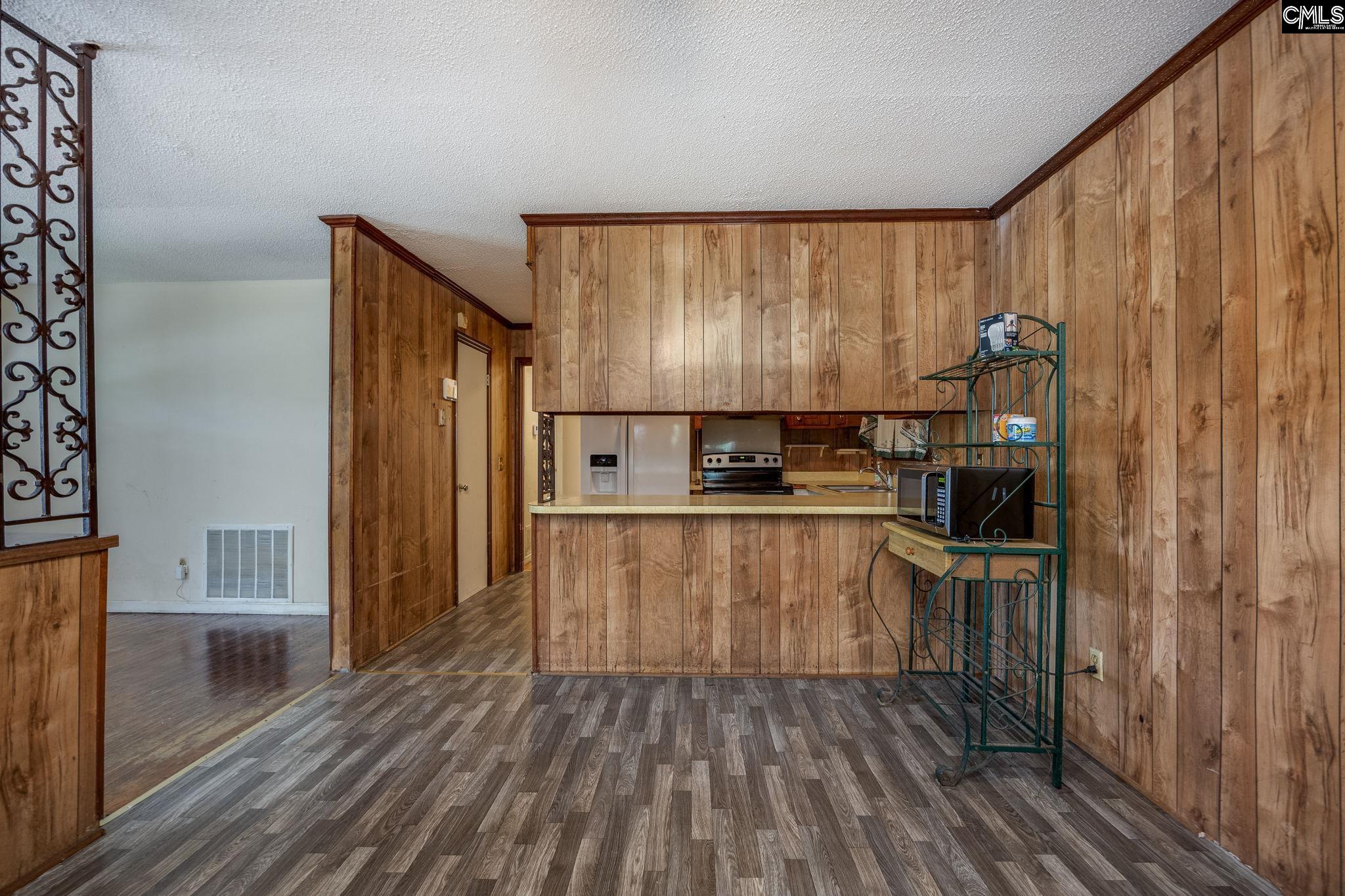 5666 Middleton Court Columbia, SC 29203 - Photo 17 of 42 a kitchen with stainless steel appliances granite countertop a refrigerator and a sink