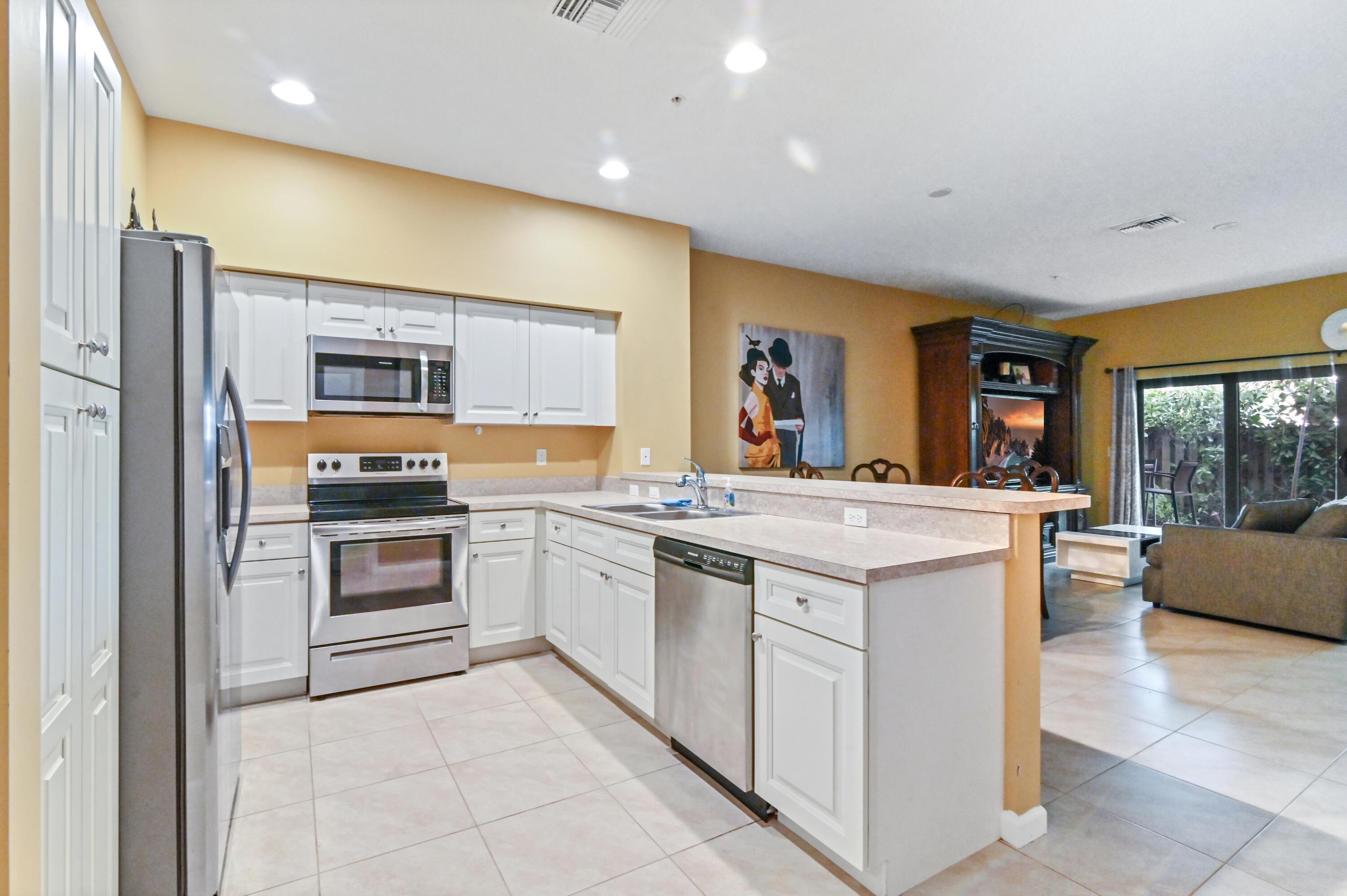 4460 Leo Lane Riviera Beach, FL 33410 - Photo 7 of 21 09 Kitchen 01