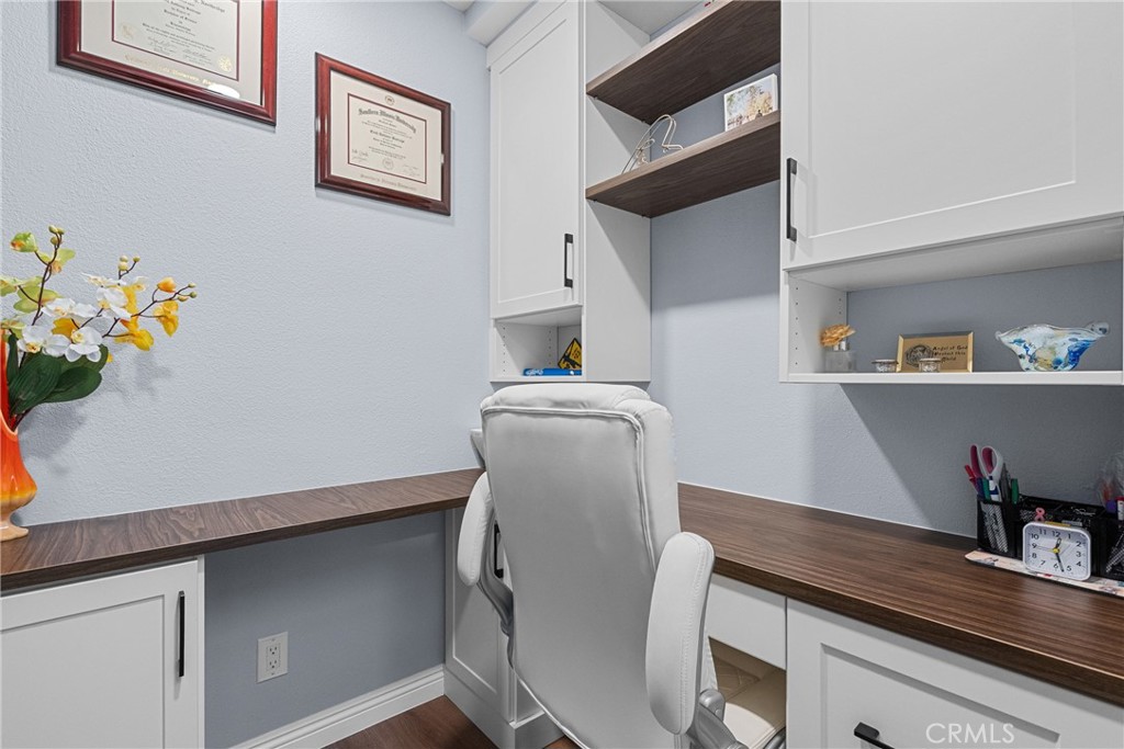 27251 Blakely Place Valencia, CA 91354 - Photo 16 of 31 a view of a workspace with furniture and wooden floor