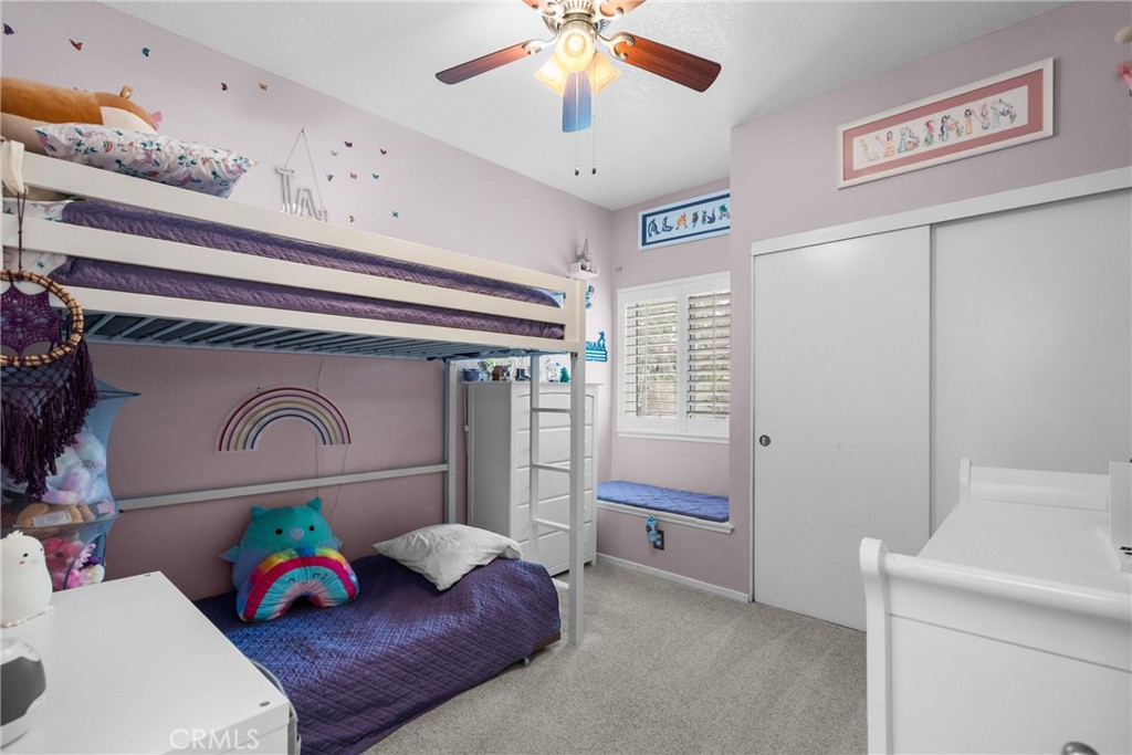 27251 Blakely Place Valencia, CA 91354 - Photo 17 of 31 a living room with furniture and a chandelier