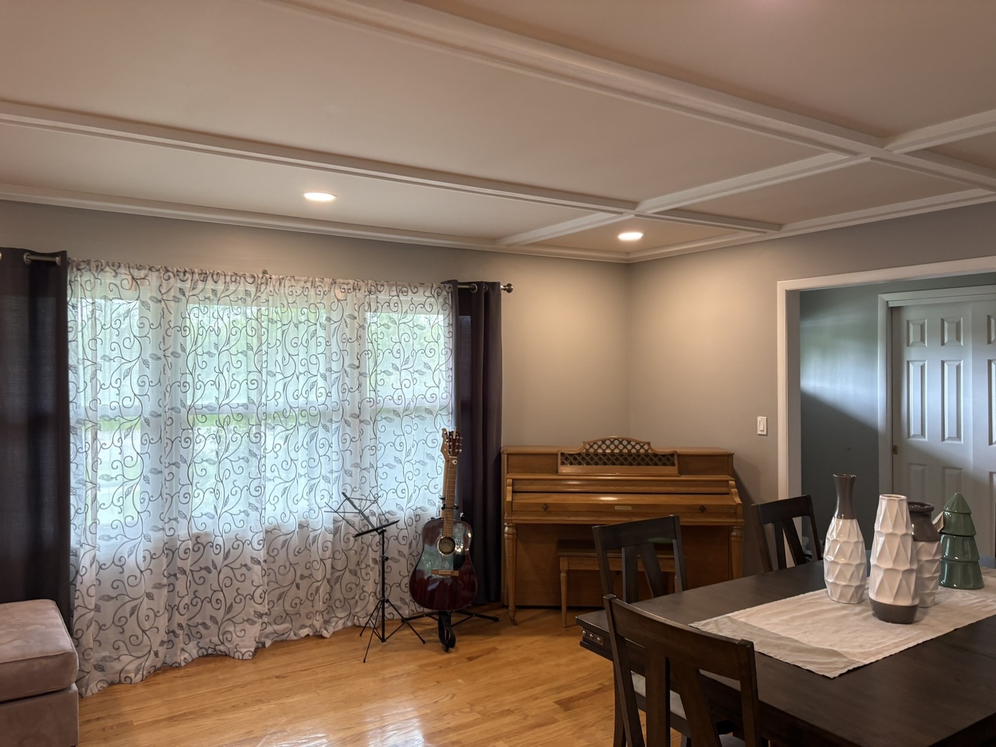 609 West Gartner Road Naperville, IL 60540 - Photo 15 of 23 a living room with furniture a piano and a window