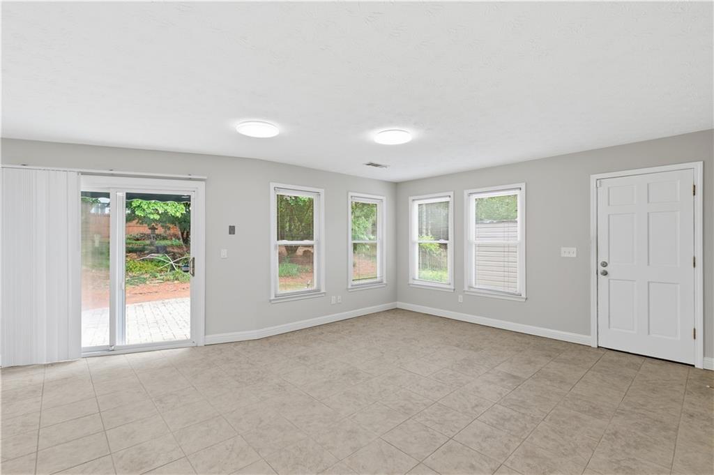 2824 Carriage Rowe Duluth, GA 30096 - Photo 11 of 45 an empty room with windows