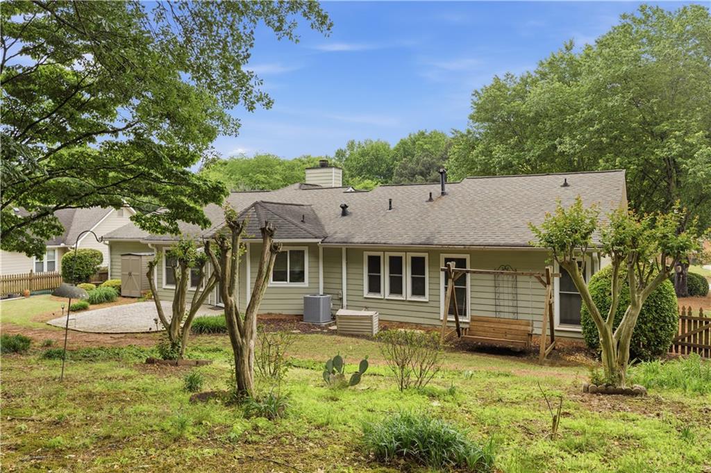 2824 Carriage Rowe Duluth, GA 30096 - Photo 36 of 45 a house view with a garden space