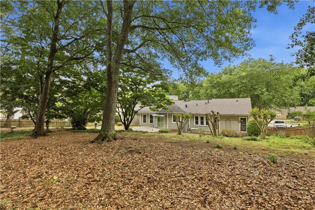 2824 Carriage Rowe Duluth, GA 30096 - Photo 39 of 45 front view of a house with a yard
