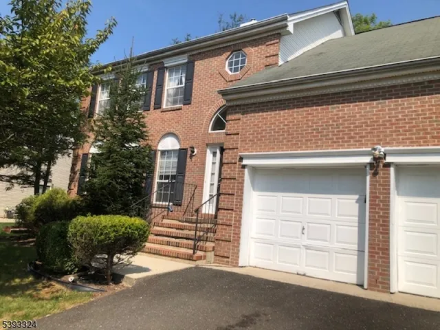 a view of a house with a garage