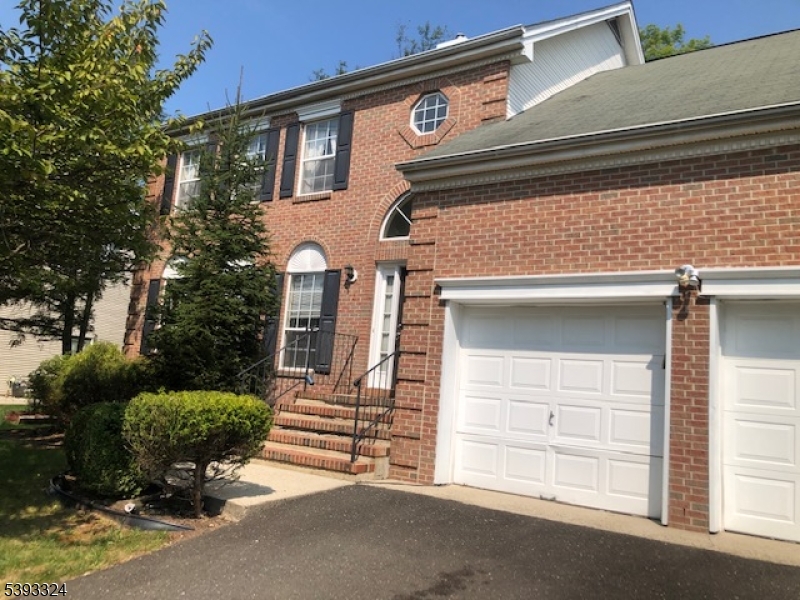 a view of a house with a garage