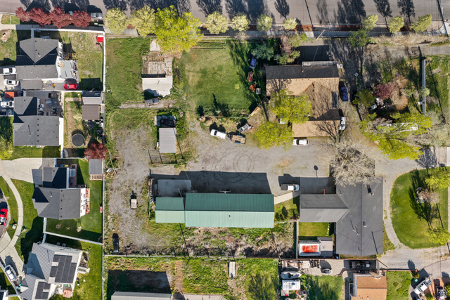 49 North 2830th West, Unit 3 Provo, UT 84601 - Photo 7 of 13 Aerial perspective of suburban area