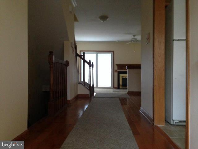 208 Rugby Road Fredericksburg, VA 22406 - Photo 2 of 4 a view of a hallway to an empty room with a window