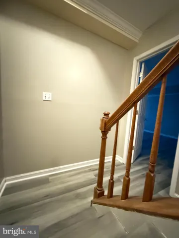 a view of balcony and wooden floor