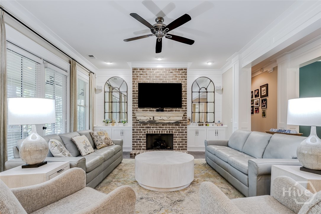 36 Oldfield Village Road Bluffton, SC 29909 - Photo 10 of 64 Gas fireplace with built in cabinets
