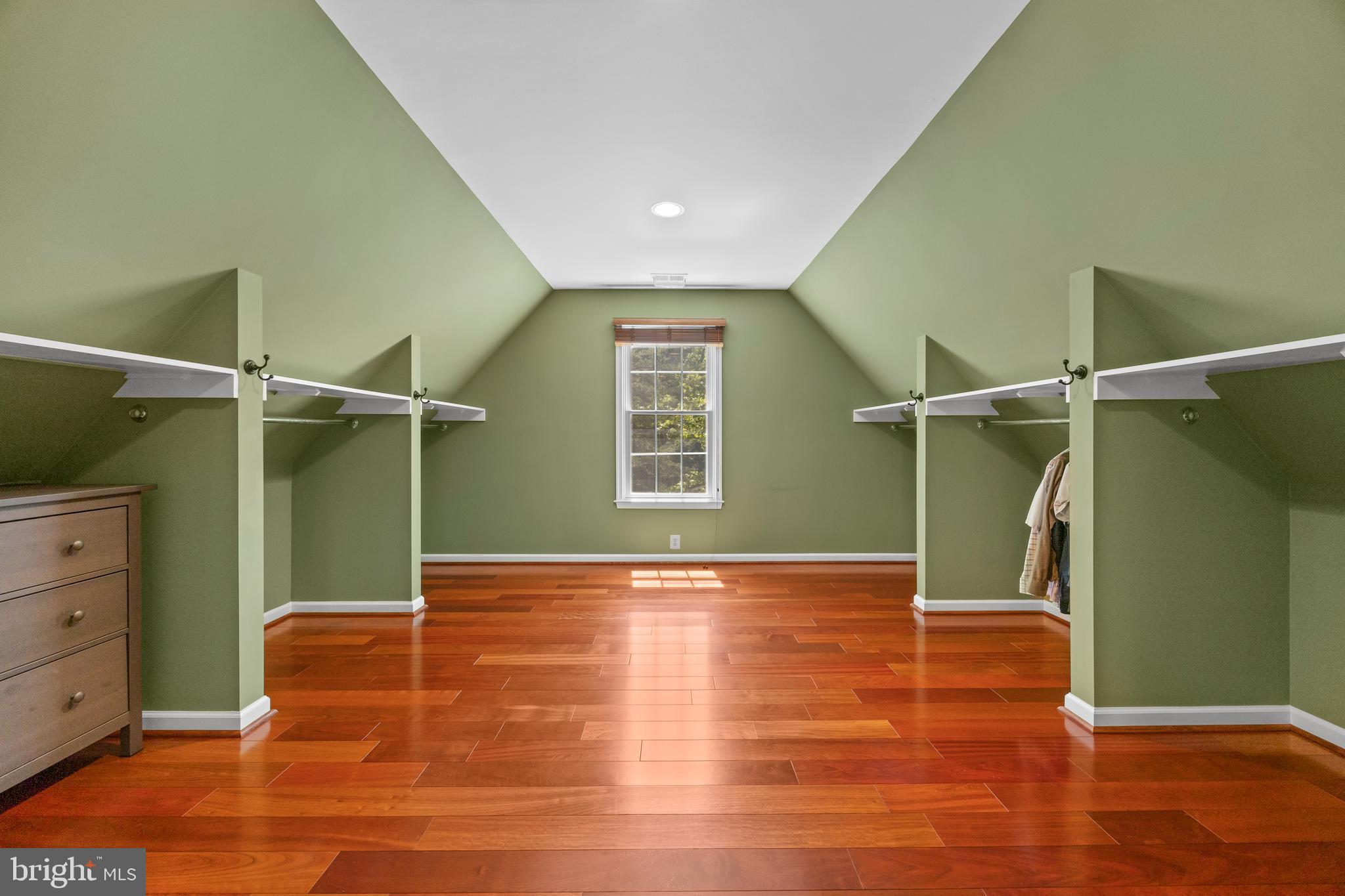 11019 Ring Road Reston, VA 20190 - Photo 37 of 78 a view of an empty room with wooden floor and a window