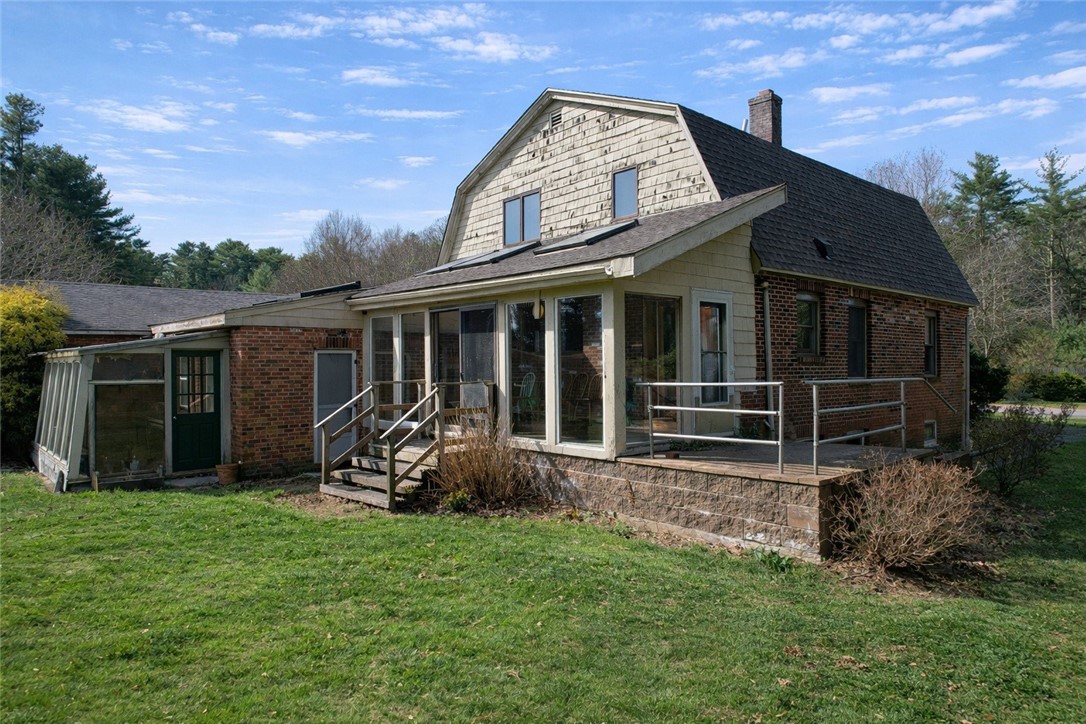 326 Jingle Valley Road South Kingstown, RI 02892 - Photo 5 of 25 Rear sunroom, raised patio & potting shed