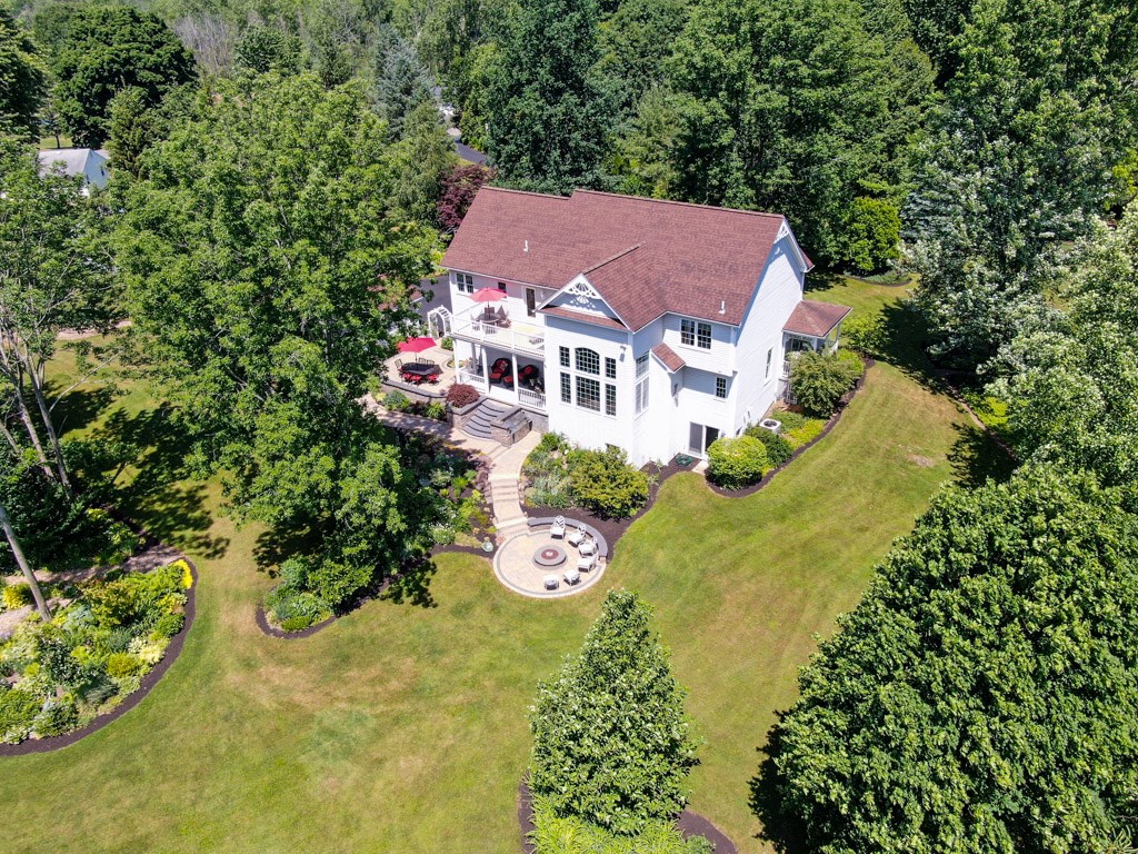 597 Chestnut Ridge Road Chili, NY 14624 - Photo 1 of 1 Aerial shot of rear showing hard scaping and spect