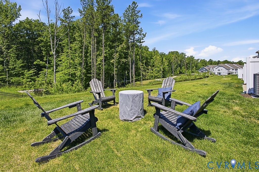 18517 Palisades Ridge Moseley, VA 23120 - Photo 37 of 55 a view of a bench in a backyard