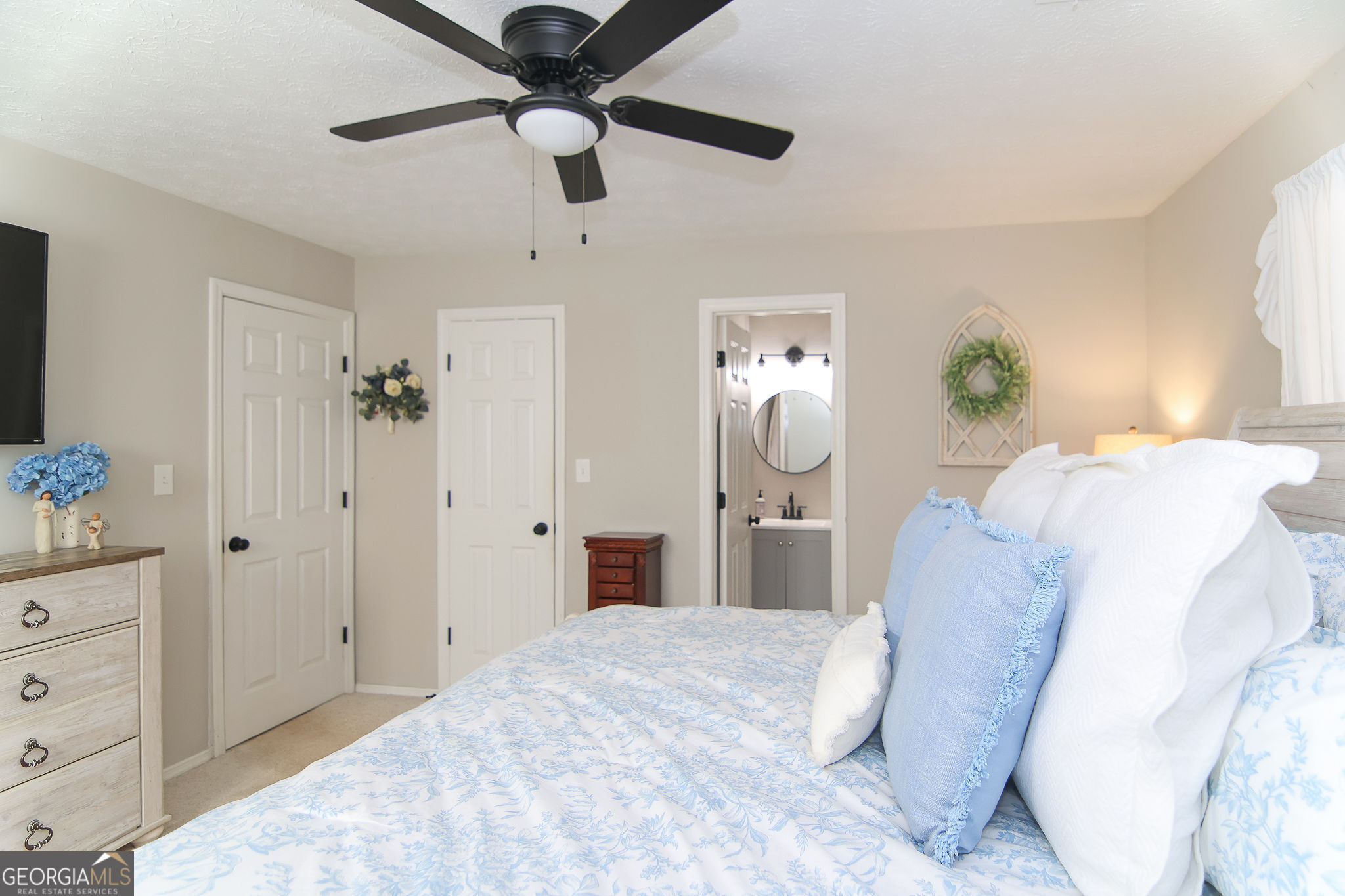 338 Young Road Franklin, GA 30217 - Photo 27 of 43 a bedroom with a bed and a dresser
