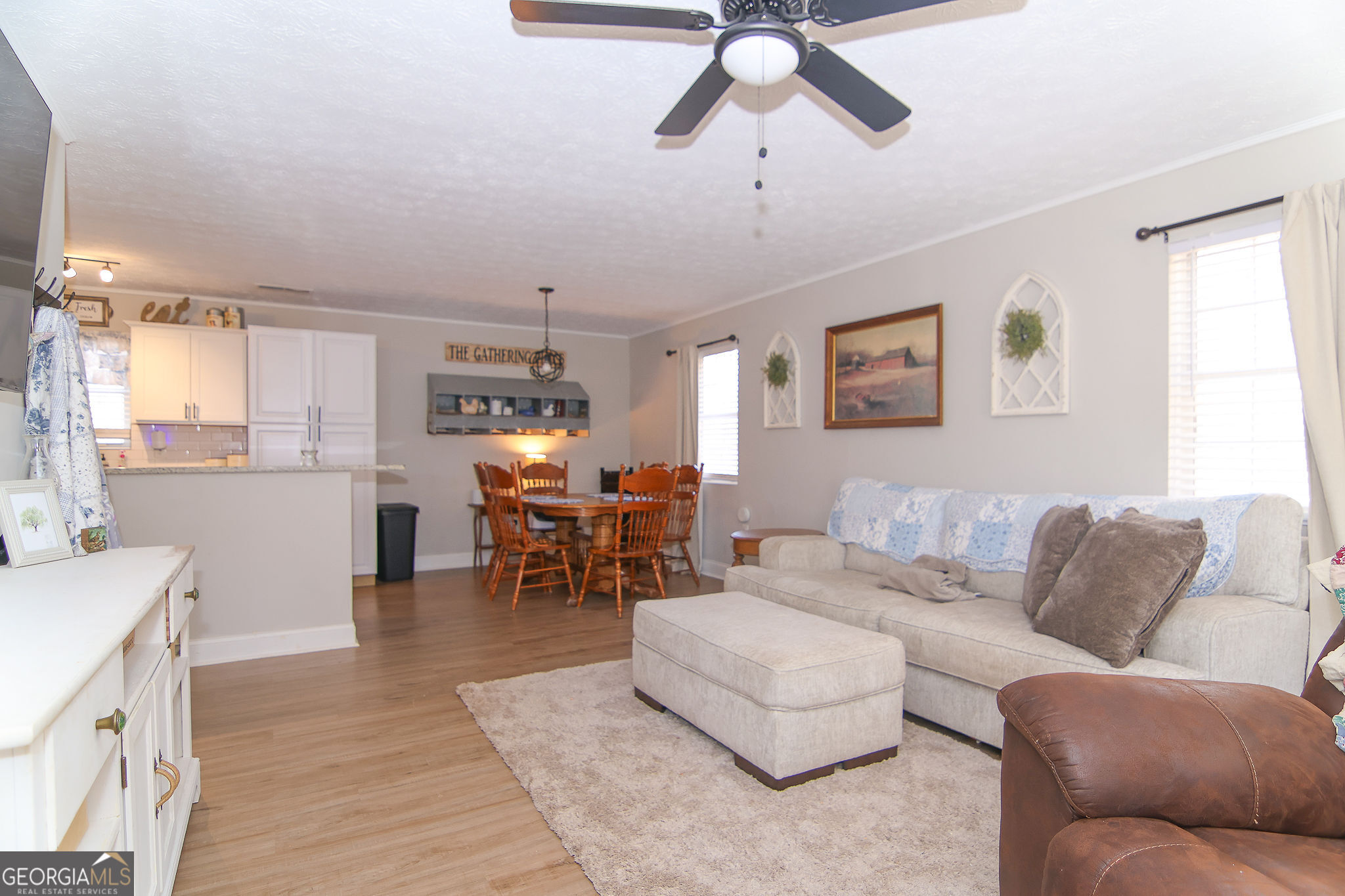338 Young Road Franklin, GA 30217 - Photo 9 of 43 a living room with furniture kitchen view and a window