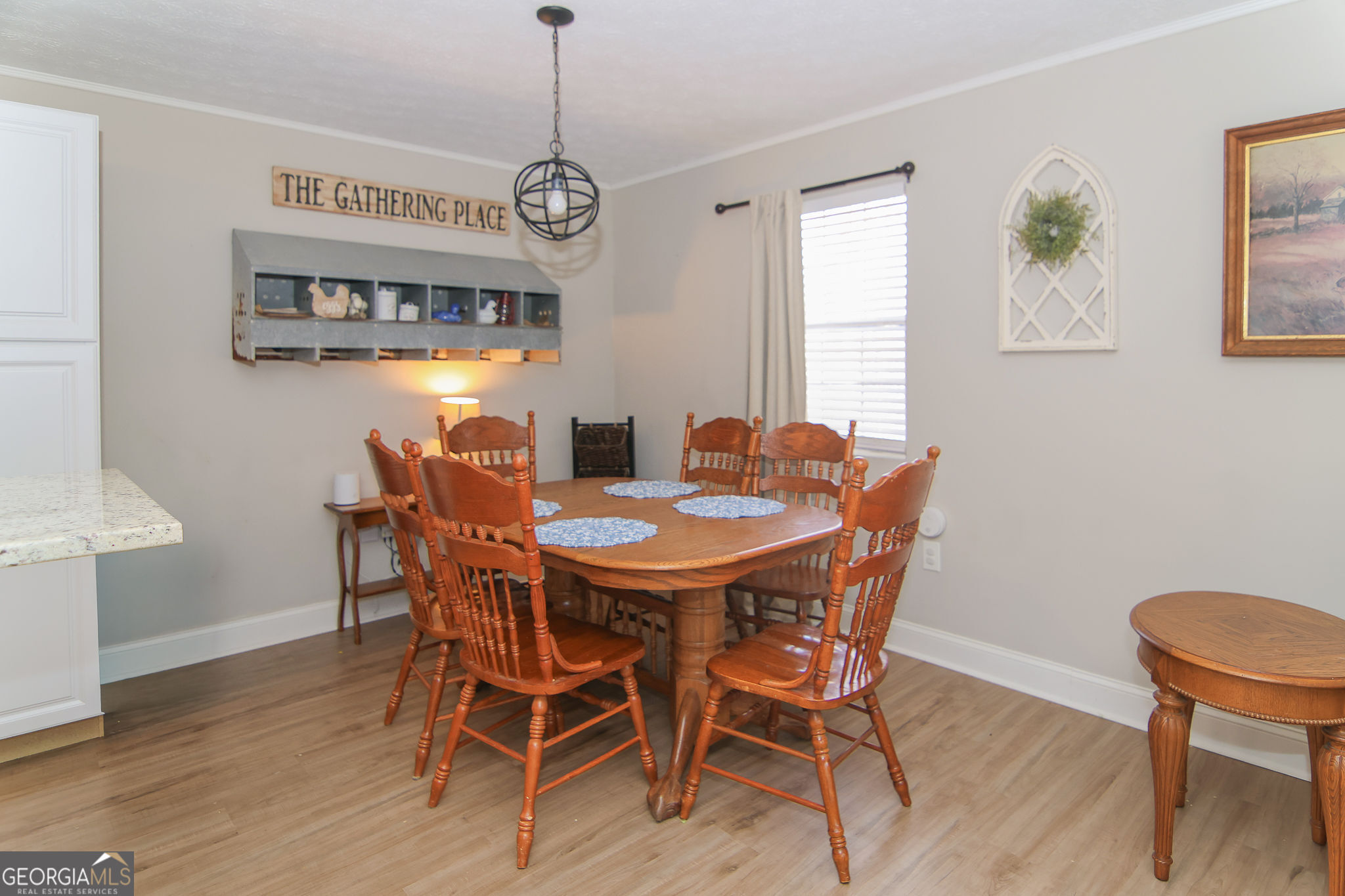 338 Young Road Franklin, GA 30217 - Photo 10 of 43 a view of a dining room with furniture window and wooden floor