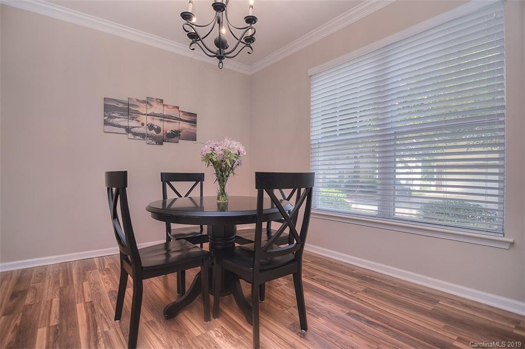 13219 Meadowmere Road Huntersville, NC 28078 - Photo 15 of 28 a view of a dining room with furniture window and outside view