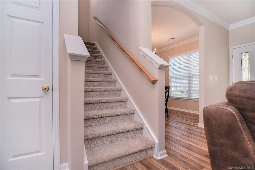 13219 Meadowmere Road Huntersville, NC 28078 - Photo 17 of 28 a view of entryway and hall with wooden floor