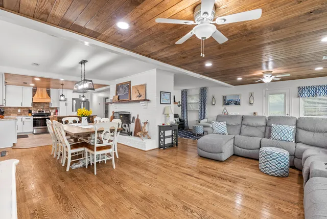 a view of staircase with white walls and a window