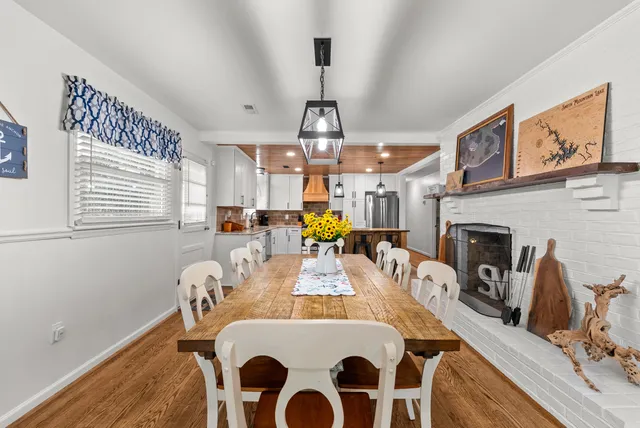 a kitchen with cabinets and white appliances