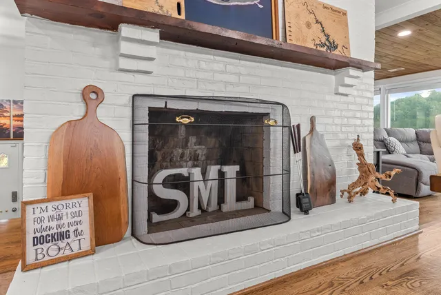 a bedroom with two beds and a chandelier