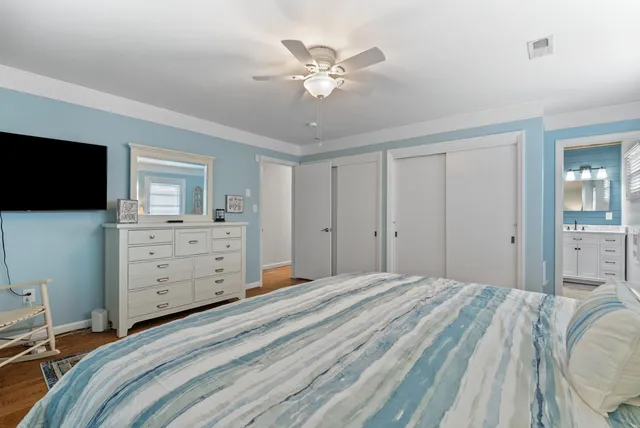 a view of a lake with a yard and mountain view