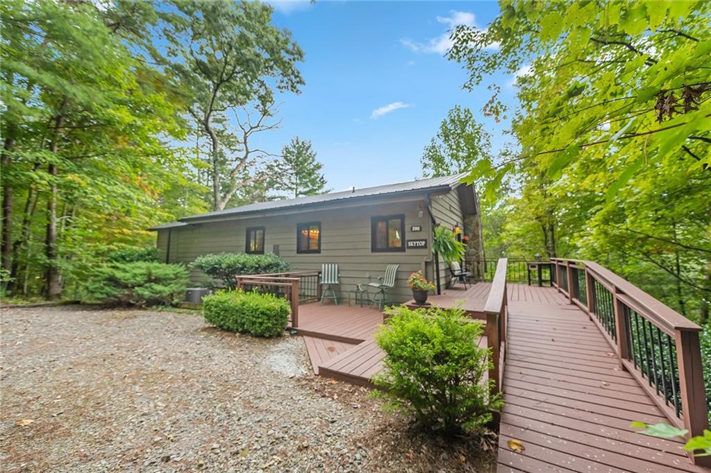 298 East Overbend Trail Blue Ridge, GA 30513 - Photo 1 of 1 a view of a house with backyard