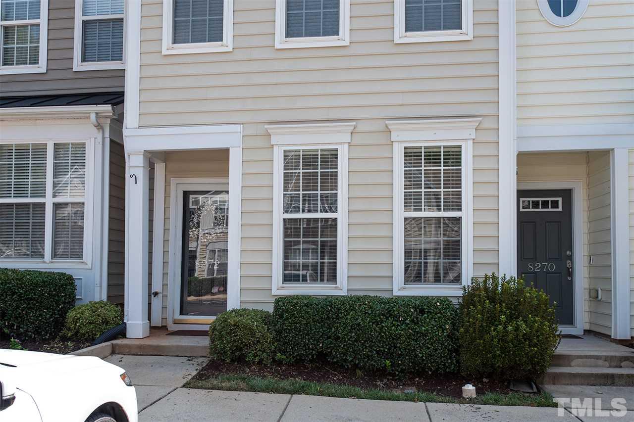 8272 City Loft Court Raleigh, NC 27613 - Photo 1 of 26 front view of a brick house many windows