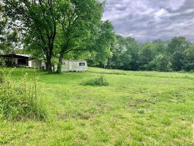 143 Reagan Road Southeast Cleveland, TN 37323 - Photo 2 of 8 a big yard with lots of green space and house in the back
